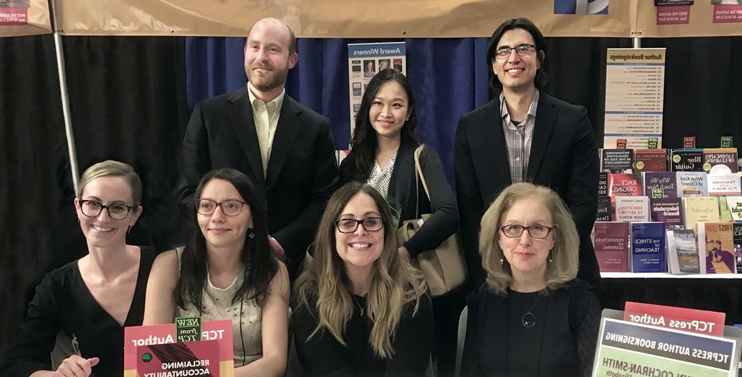 Co-authors at book signing